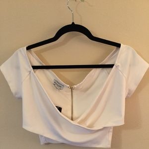 BEBE White Criss Cross Zipper Up Back Crop Top